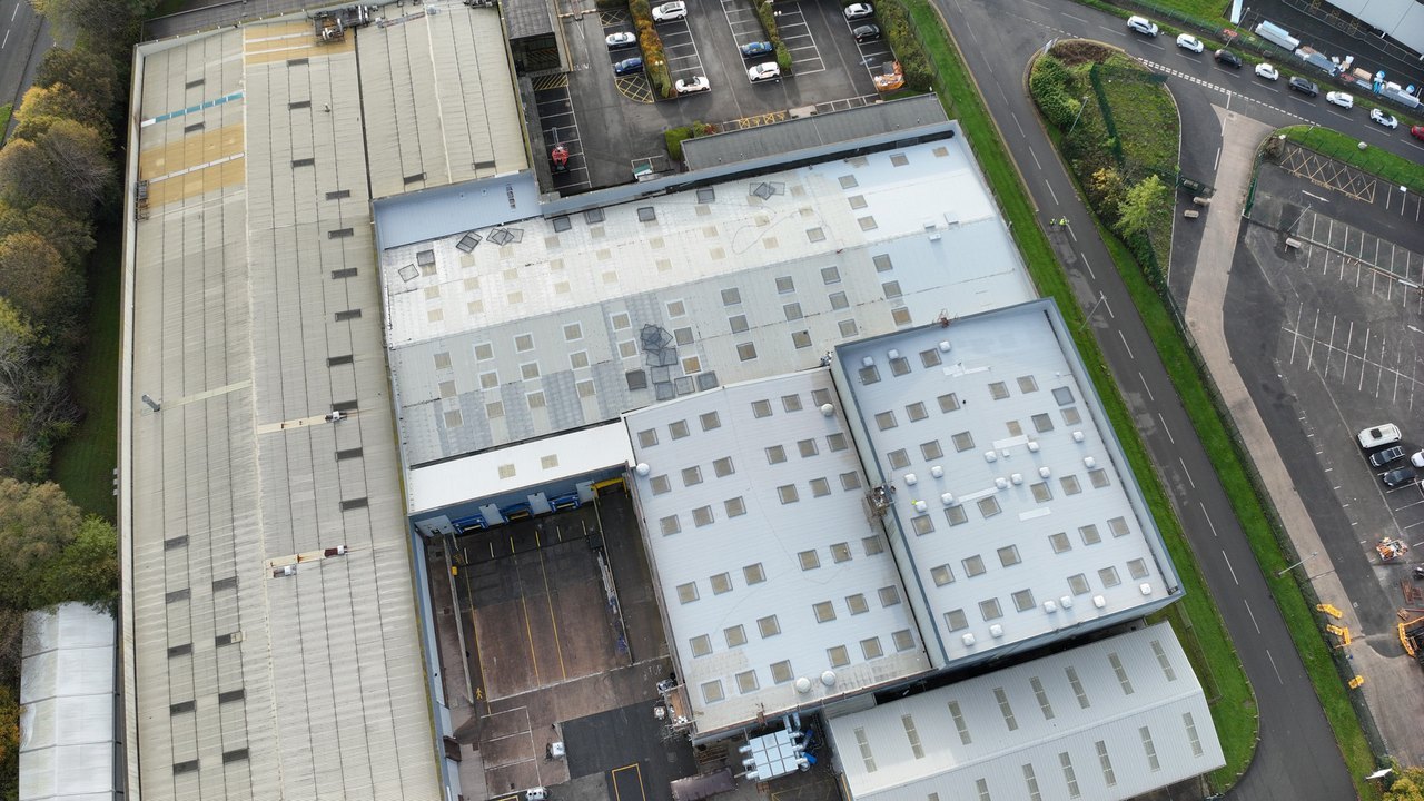 Aerial of linked units, roofs and loading court at Chesford Grange.