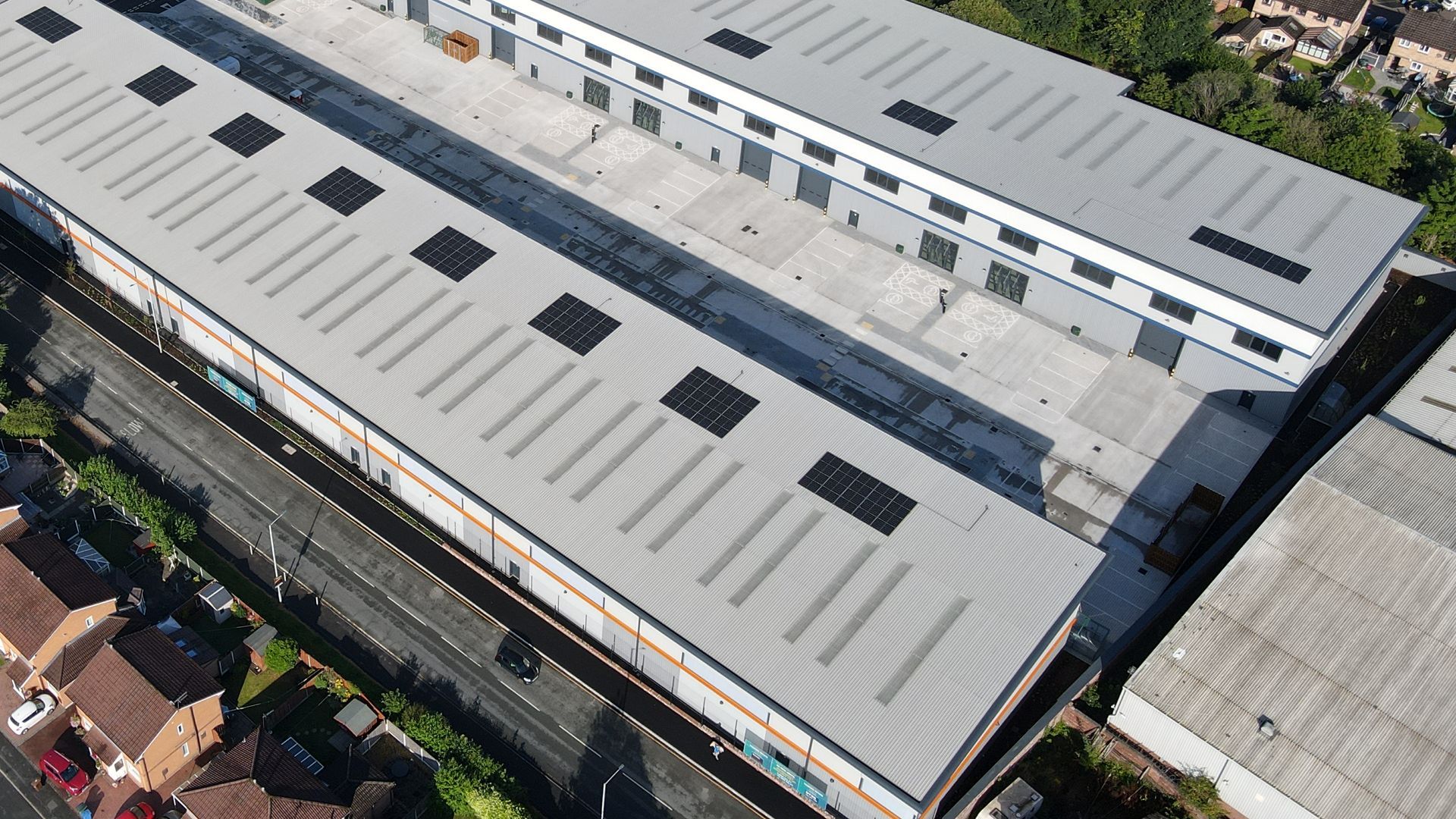 Aerial view of industrial buildings.